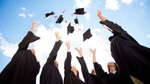 Hats being thrown into the air